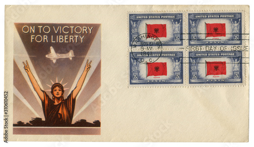 Washington, D.C., The USA - 9 November 1943: US historical envelope: cover with a patriotic cachet On to victory for liberty, Statue of liberty, Albania flag stamp