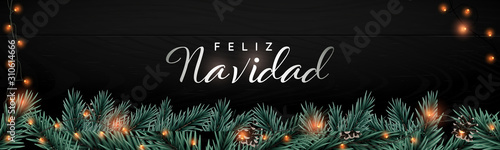 Feliz Navidad - Merry Christmas. Vector Christmas banner. Website long header with fir tree branches and light garlands on black background. Winter season design concept.