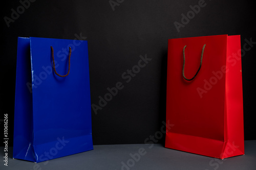 Two color Shopping bag isolated on black background. Packaging template mockup. Delivery concept advertising mock. Shopping Concept