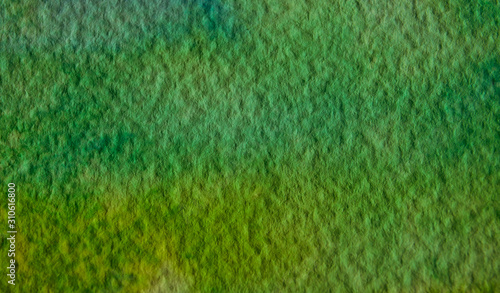 Texture gros plan de papier aquarelle avec couleurs vert et jaune