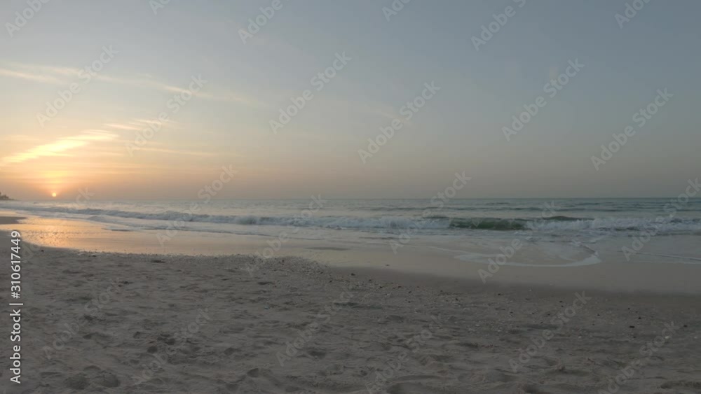 Picturesque sunset over exotic beach. Nature background Picturesque sunset over exotic beach. Nature background