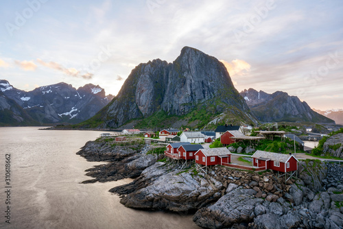 Rorbu houses on the island of Hamnoy in Lofoten, Norway during the midnight sun with calm weather and soft light..Traveling and holiday concept.