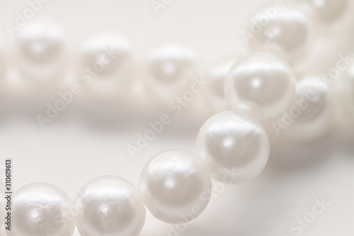 Pearl beads nacrous string jewelry isolated white background