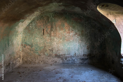 Abandoned interior of an old farmhouse - Room with abandoned vault