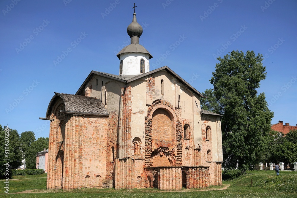 Veliky Novgorod, Russia, May 2018. An old brick Orthodox church under restoration.
