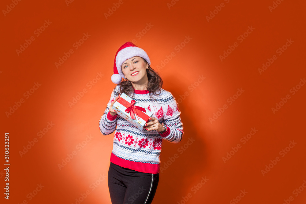 portrait a young woman with a santa hat portrait a young woman with a santa hat