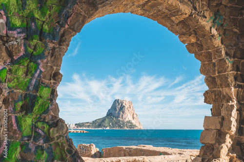 Nice landscape of Calp, Spain: beach and rock Ifach photo