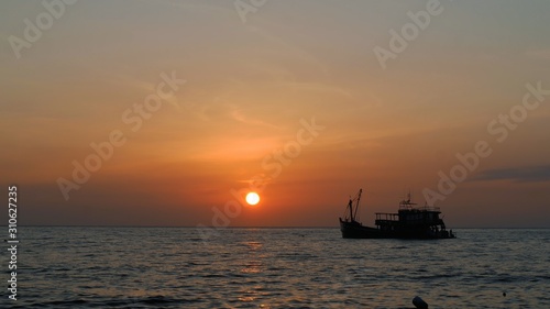 sunset on the sea © Yaowaluk