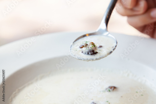White creamy oringi and staw mushroom soup
