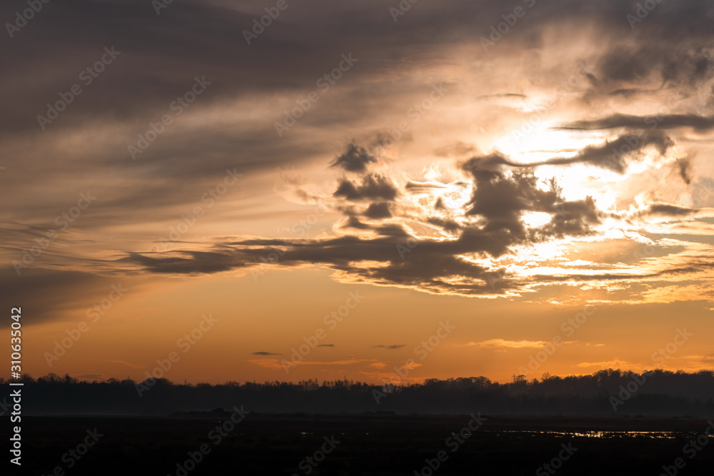 Clouds In front Of Orange Sunset Clouds In front Of Orange Sunset
