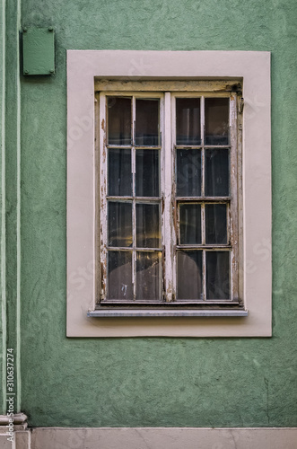 WINDOW - A historic tenement house in a side street of old Poznan