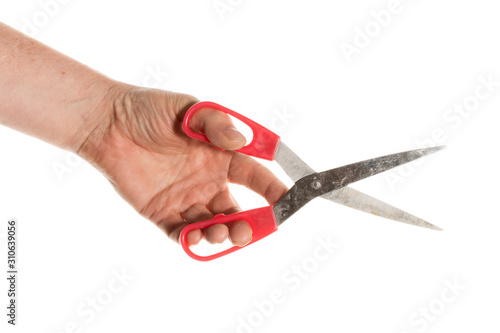 scissors in hand isolated on white background