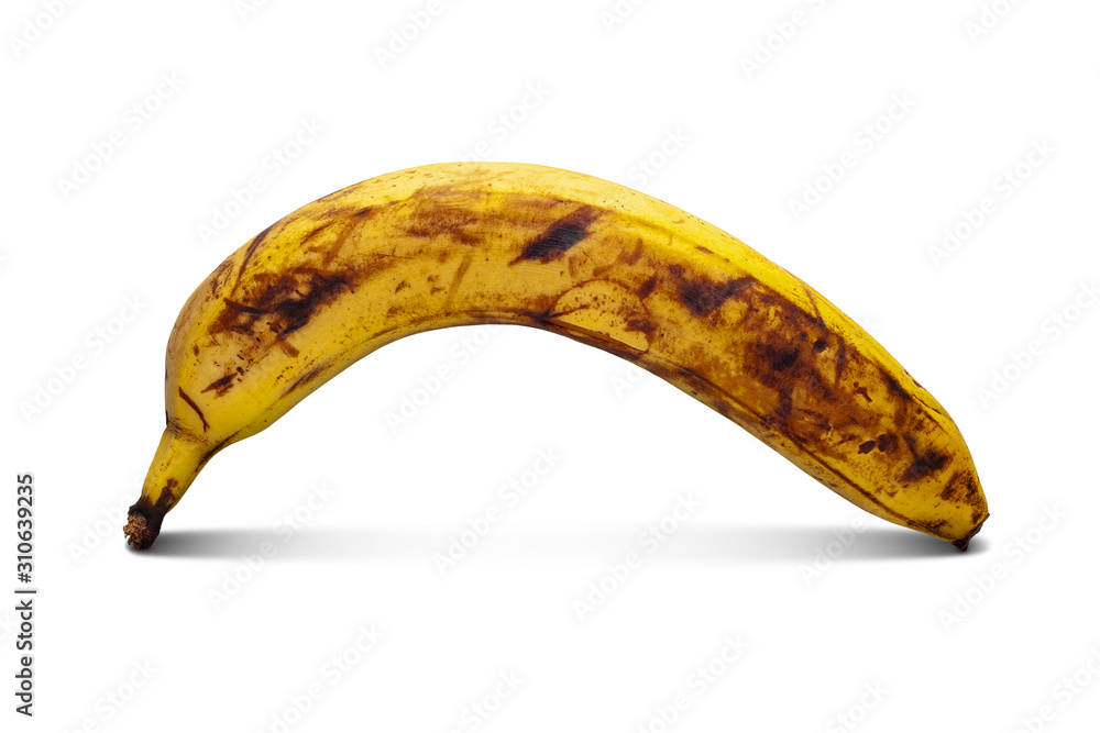 One overripe banana. Yellow banana isolated on a white background.