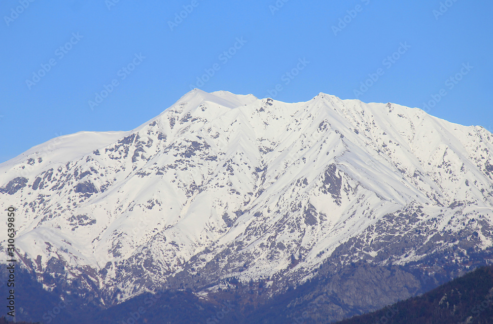 landscape with mountains in Italy in winter with snow
