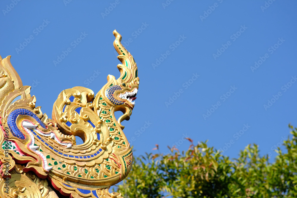 dragon on roof of temple in thailand