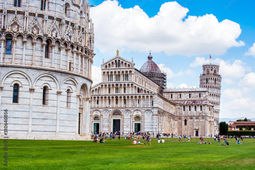 Picturesque landscape with church and famous sloping tower in Pisa, Italy. fascinating exotic amazing places.