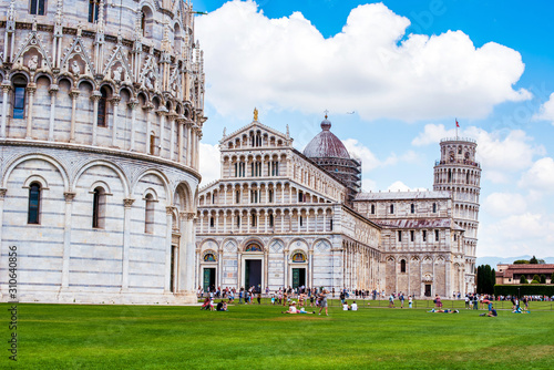 Obraz na płótnie Picturesque landscape with church and famous sloping tower in Pisa, Italy. fascinating exotic amazing places. w salonie