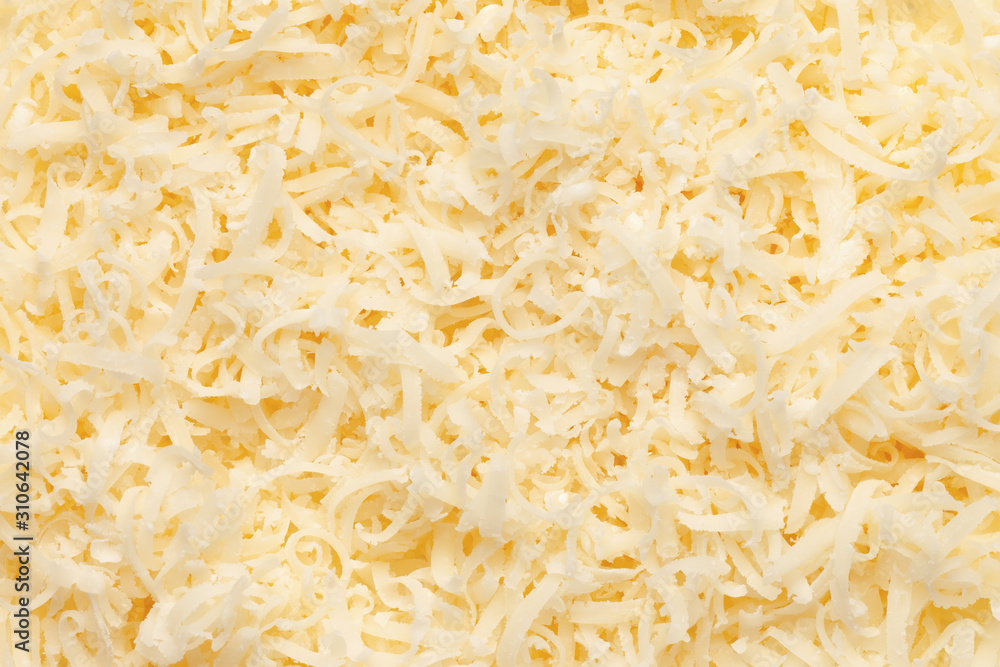 Grated parmesan cheese texture. Top view. Grated parmesan cheese texture. Top view.