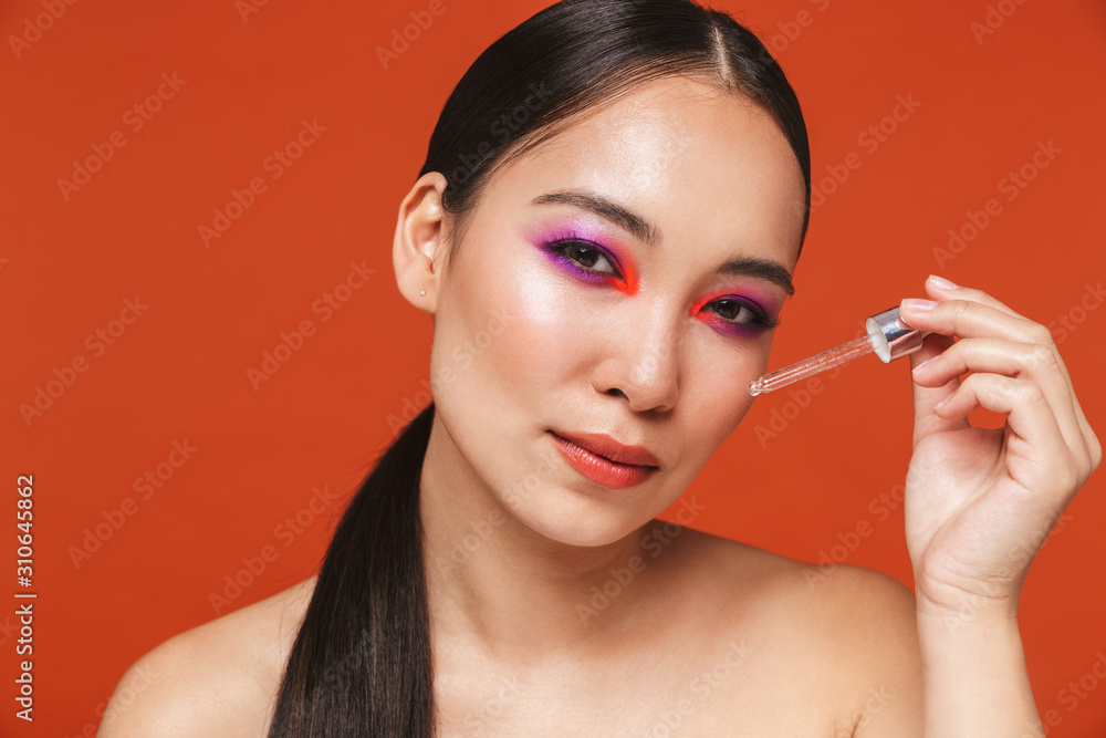 Beauty portrait of an attractive young topless asian woman Beauty portrait of an attractive young topless asian woman