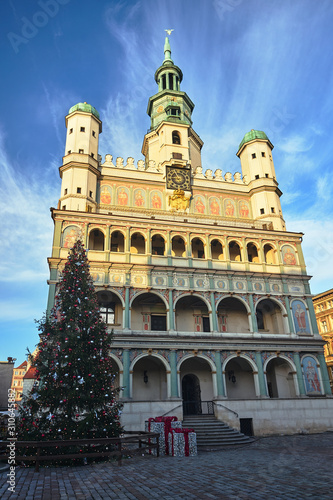 the facade of Renaissance town hall and christmas decorations in city of Poznan. © GKor
