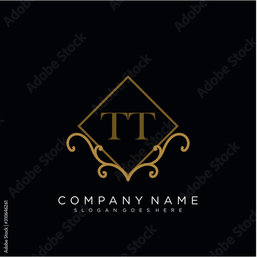 Initial letter TT logo luxury vector mark, gold color elegant classical