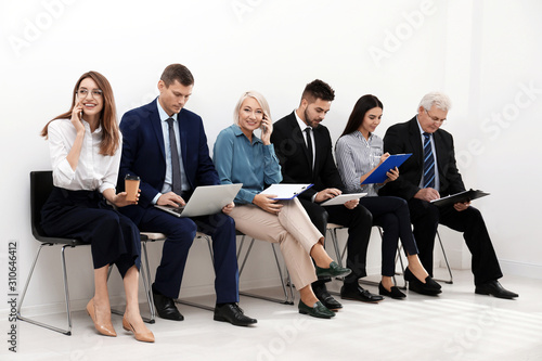 People waiting for job interview in office