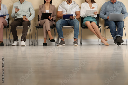 People waiting for job interview in office  closeup