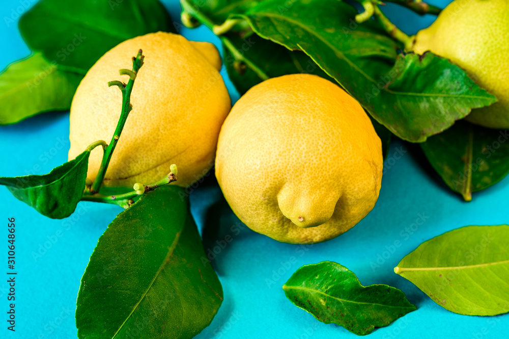 Lemons with leaves.