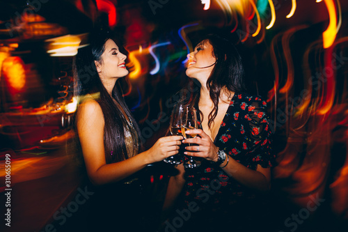 Canvas Print Two girls having fun at the club on New Year's party