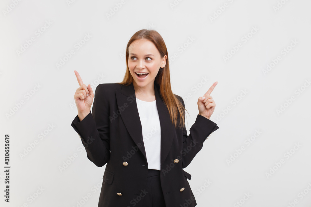 Studio shot attractive friendly smiling happy caucasian 25s woman wearing black jacket pointing sideways different directions smiling presenting choices smiling suggesting goods, white background Studio shot attractive friendly smiling happy caucasian 25s woman wearing black jacket pointing sideways different directions smiling presenting choices smiling suggesting goods, white background