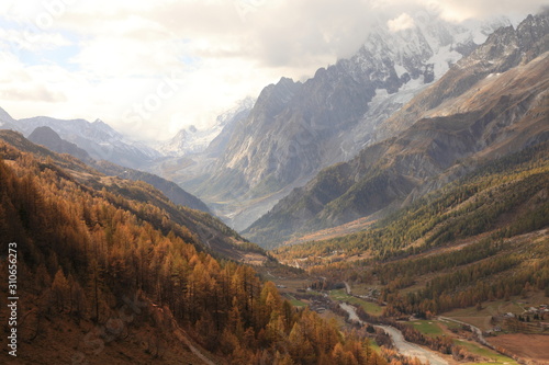 Beautiful mountain landscape with summits, valleys and waterfalls in the Swiss alps