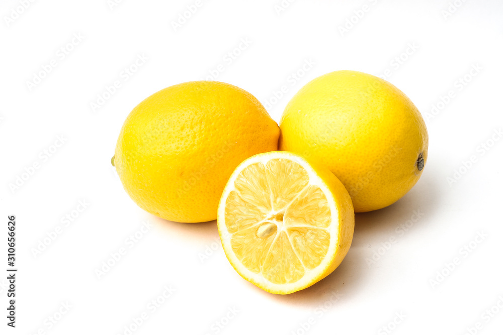 Collection of fresh yellow lemons isolated on white background.