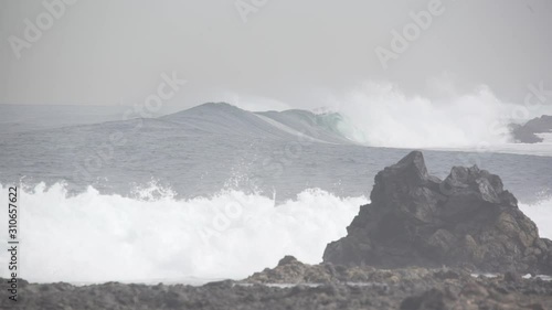 Waves breaking on a rocky shore