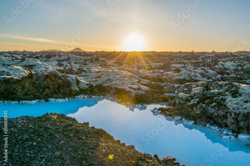Iceland blue water and rocky landscape in the sunset