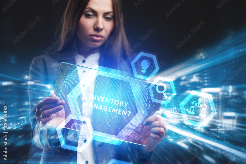Business, Technology, Internet and network concept. Young businessman working on a virtual screen of the future and sees the inscription: Inventory management Business, Technology, Internet and network concept. Young businessman working on a virtual screen of the future and sees the inscription: Inventory management