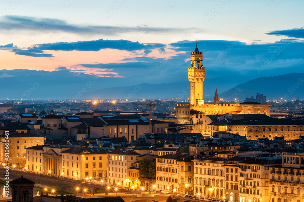 Amazing night view of Florence city, Italy with Palazzo Vecchio.