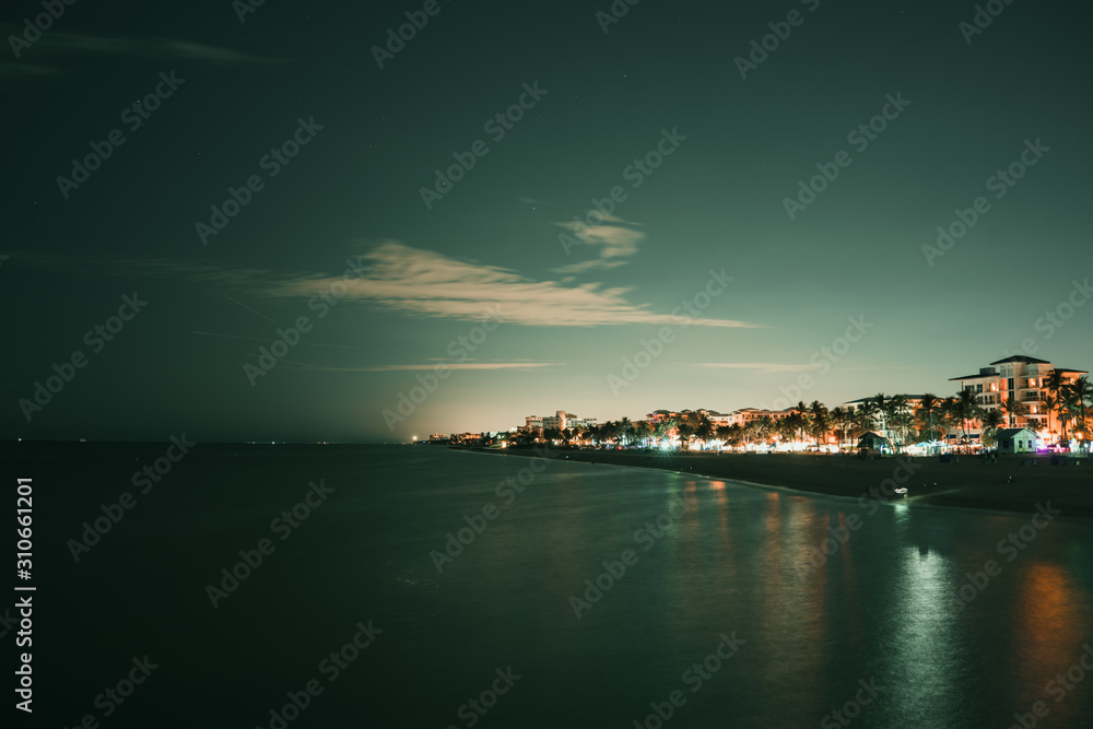 Wide angle, long exposure photography of Deerfield Beach at night, Florida, USA