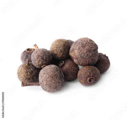 Spicy black pepper grains isolated on white