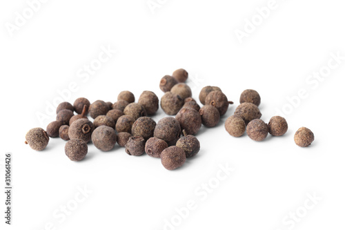 Spicy black pepper grains isolated on white