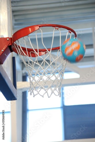 basketball hoop and net on blue background