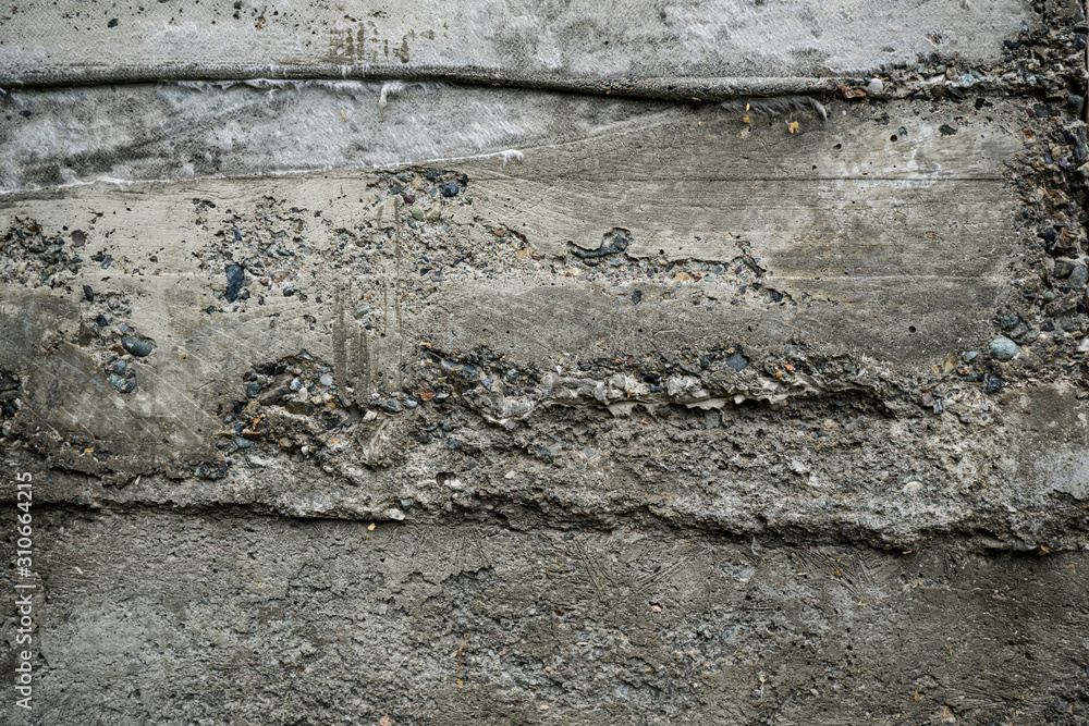 Naklejka premium Texture of uneven old concrete slab. Background image macro photo of concrete