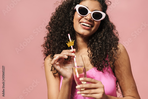 Canvas Print Image of laughing african american woman drinking champagne