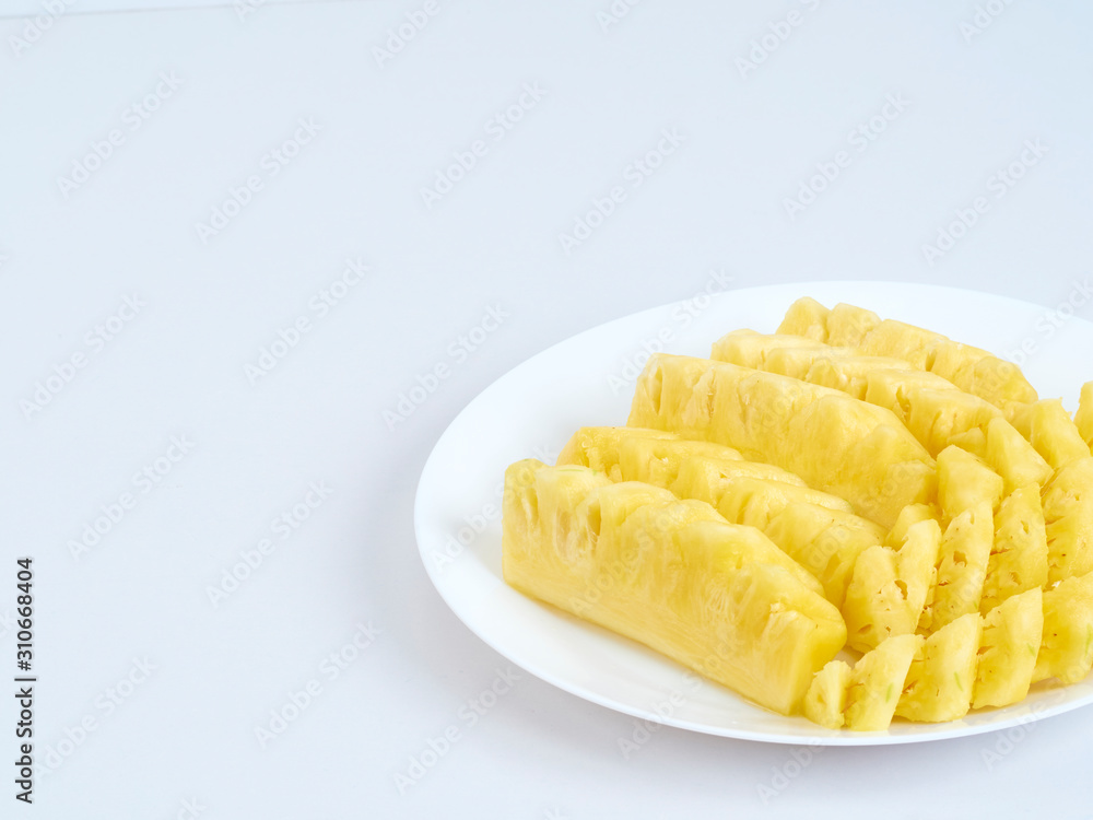 Pineapple slices in white plate Pineapple slices in white plate