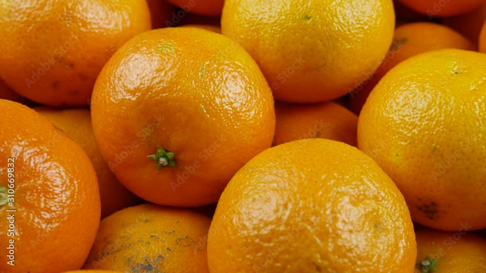Bunch of fresh mandarin oranges on market, close-up Bunch of fresh mandarin oranges on market, close-up