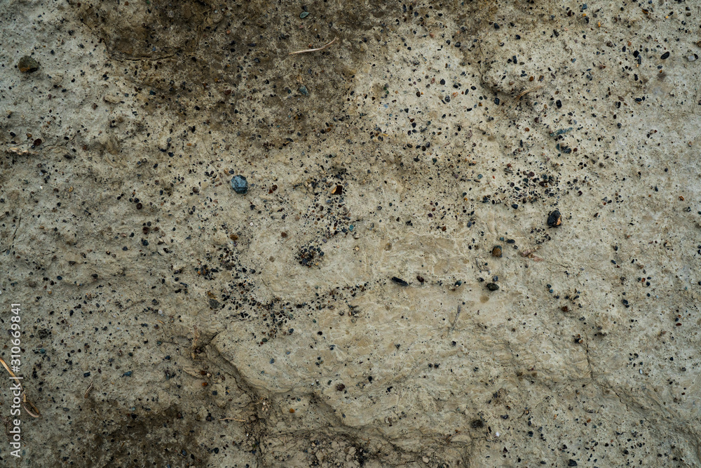 Texture of dried cracked clay. Macro background image of dried clay