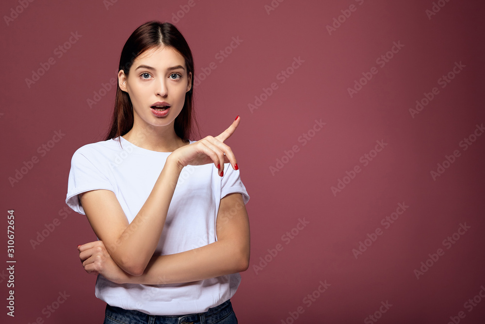 Surprised lovely young girl being shocked by interesting unexpected rumor. Surprised lovely young girl being shocked by interesting unexpected rumor.