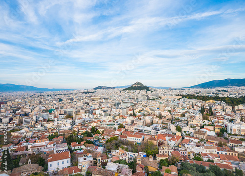 Aerial view of Athens, Greece with houses, blue sky and Lycabettus hill