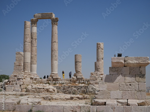 Tall majestic pillars of the ruins of the Roman site of Amman Citadel on a hill in the city center of the capitol of Jordan