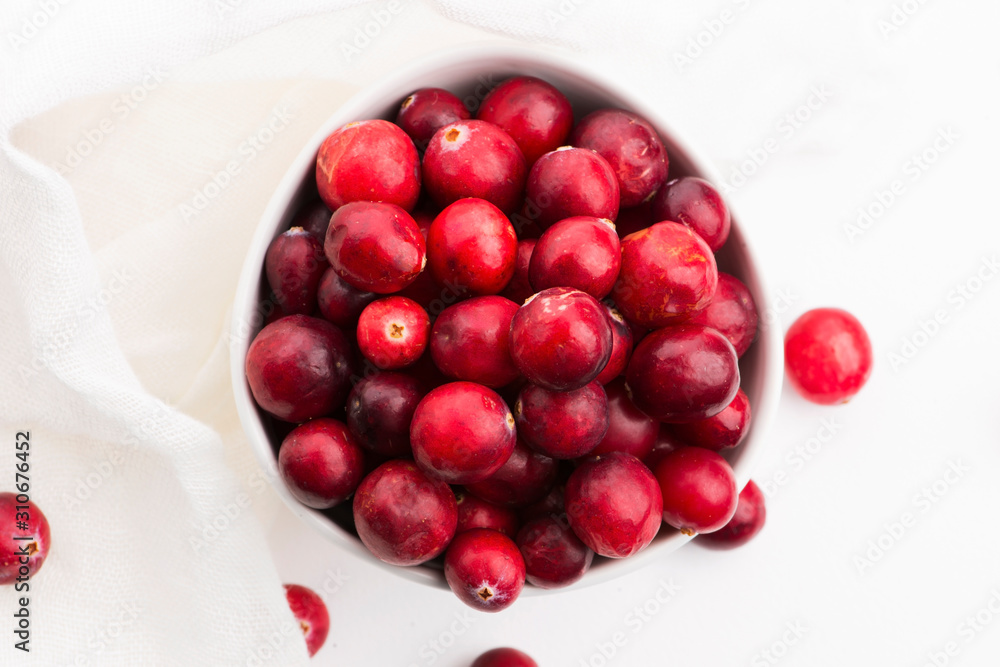 Ceramic bowl of Cranberry on white background Ceramic bowl of Cranberry on white background