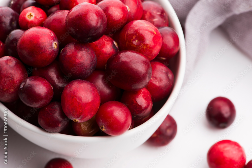 Ceramic bowl of Cranberry on white background Ceramic bowl of Cranberry on white background